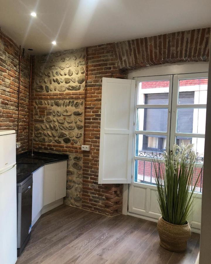 Albany Ancha Hotel เลออน ภายนอก รูปภาพ A kitchen in Madrid, Spain