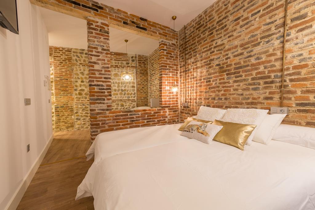 Albany Ancha Hotel เลออน ภายนอก รูปภาพ A bedroom at the hotel